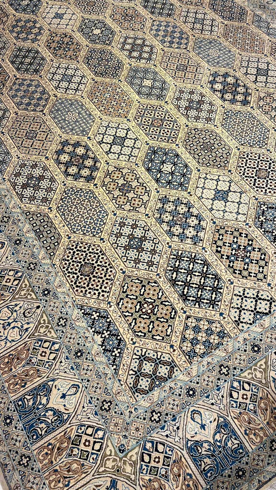 Authentic Persian Nain rug from Iran, showcasing intricate patterns and natural dyes.